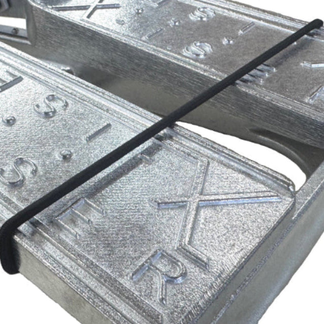 Xiser pedal retainer band covering the pedals on a folded mini stepper