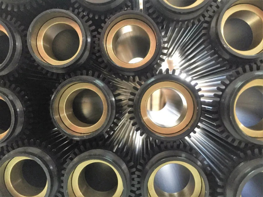 A close up view of the high quality cylinder parts of the Xiser trainer showing their internal brass bushings